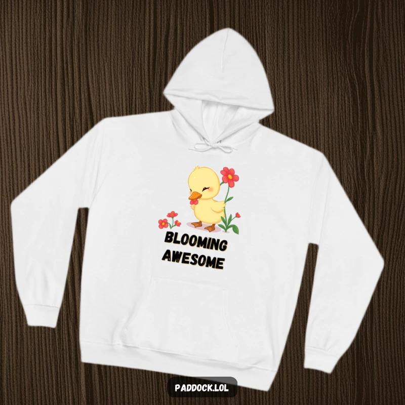 Funny Hoodie of a curious duckling gently pecking at a bright red flower, ideal for cozy nature lovers.